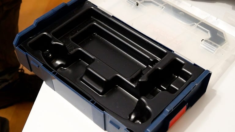 A thermoformed insert lies in a toolbox