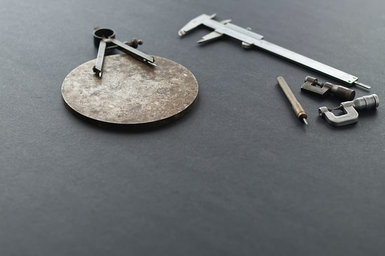 Measuring tools lie on a surface